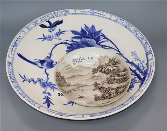 A Chinese blue and white charger, diameter 45cm and an enamelled porcelain dish